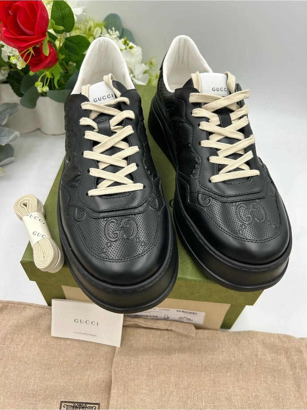 Men's Gucci, GG embossed, black leather sneakers size 11 fits 11.5 made in Italy